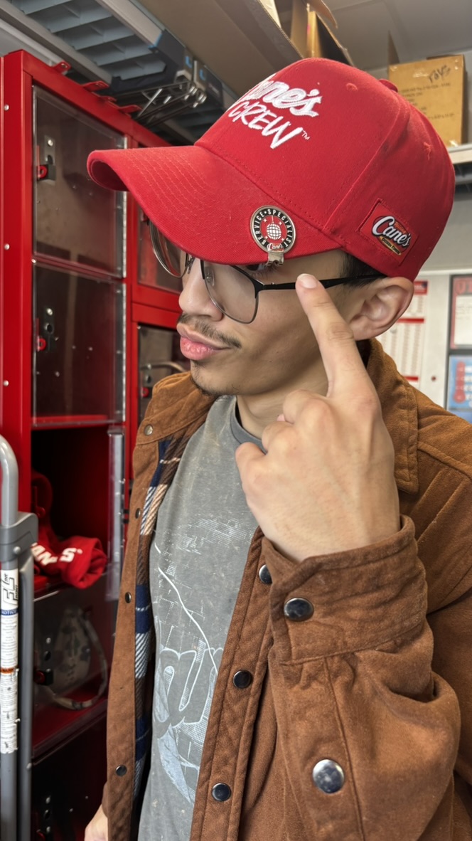 Josiah wearing his Cane’s Crew cap and Service Specialist pin